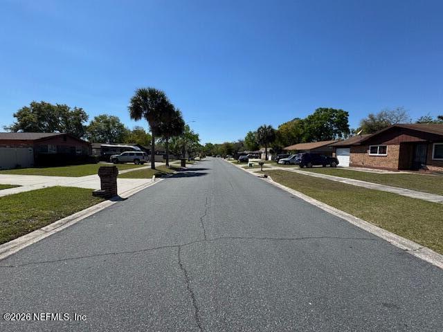 4368 Bedivere Road Jacksonville, FL 32208 - Photo 20 of 20 a view of a street with houses