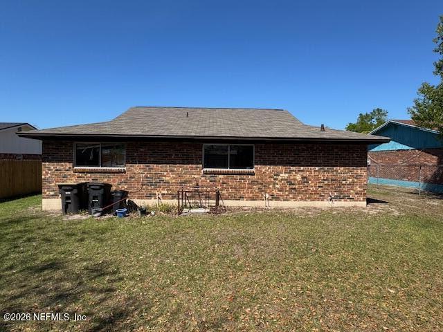 4368 Bedivere Road Jacksonville, FL 32208 - Photo 3 of 20 a view of a house with backyard porch and sitting area