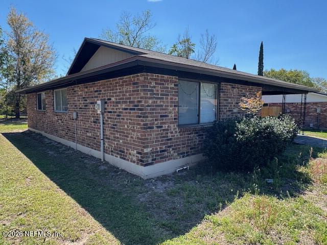 4368 Bedivere Road Jacksonville, FL 32208 - Photo 5 of 20 a front view of a house with garden