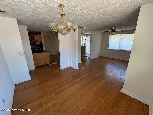 4368 Bedivere Road Jacksonville, FL 32208 - Photo 9 of 20 a view of a room with wooden floor and stairs