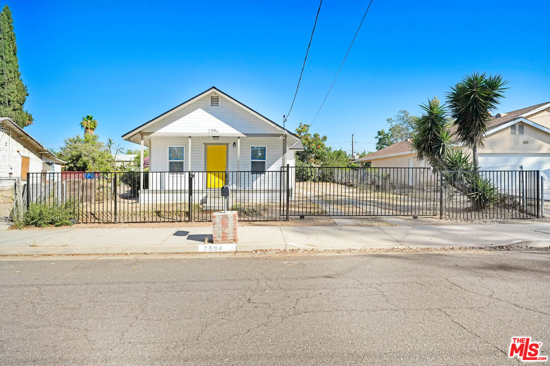 7594 Peters Street Riverside, CA 92504 - Photo 3 of 16 a view of a house with a patio