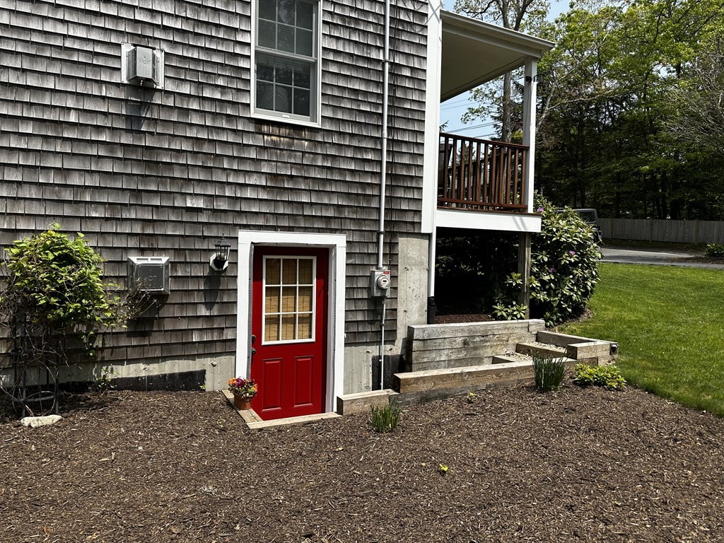 1 Park Road, Unit 1 Sandwich, MA 02644 - Photo 2 of 25 a view of a house with backyard and porch