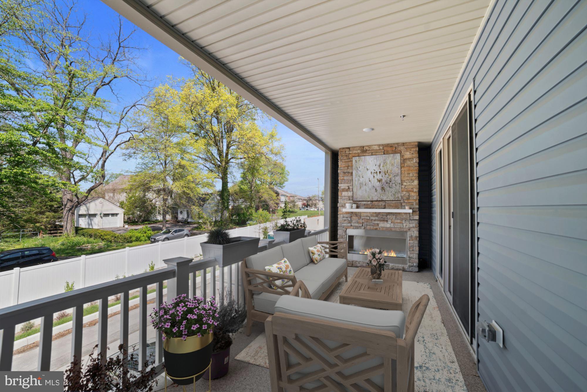 17836 Porter Road Ashton, MD 20861 - Photo 32 of 40 Lanai with Fireplace Virtually Staged