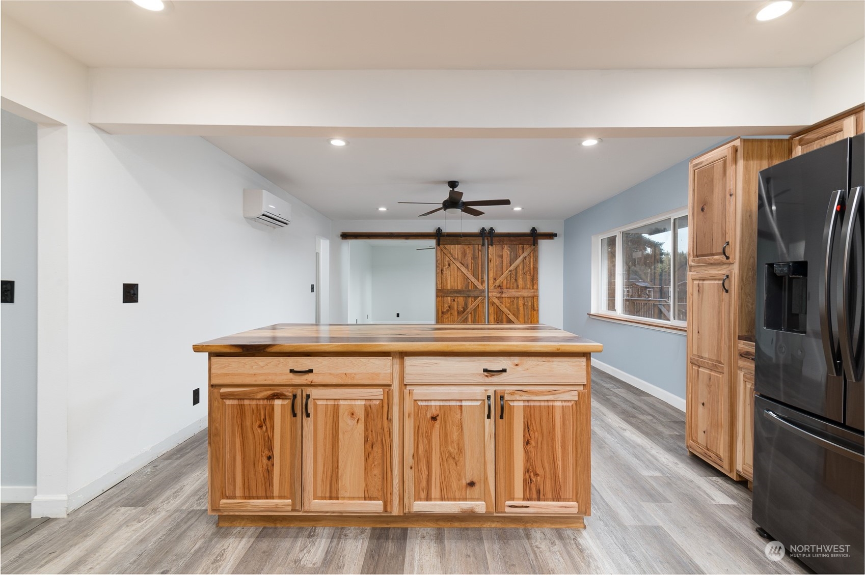 8120 Delta Line Road Custer, WA 98240 - Photo 13 of 40 a kitchen with stainless steel appliances granite countertop a stove a refrigerator and a microwave