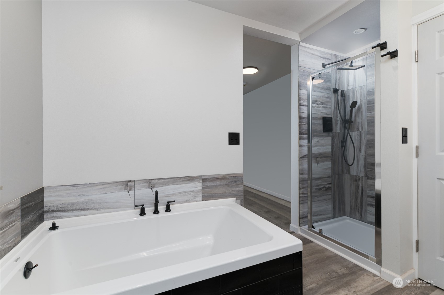 8120 Delta Line Road Custer, WA 98240 - Photo 19 of 40 a bathroom with a bathtub and a shower