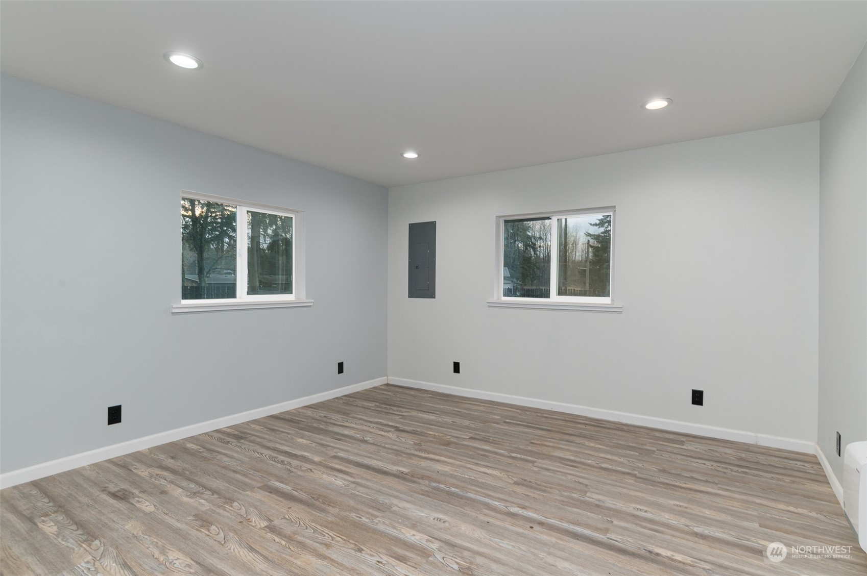 8120 Delta Line Road Custer, WA 98240 - Photo 22 of 40 a view of a room with wooden floor and window