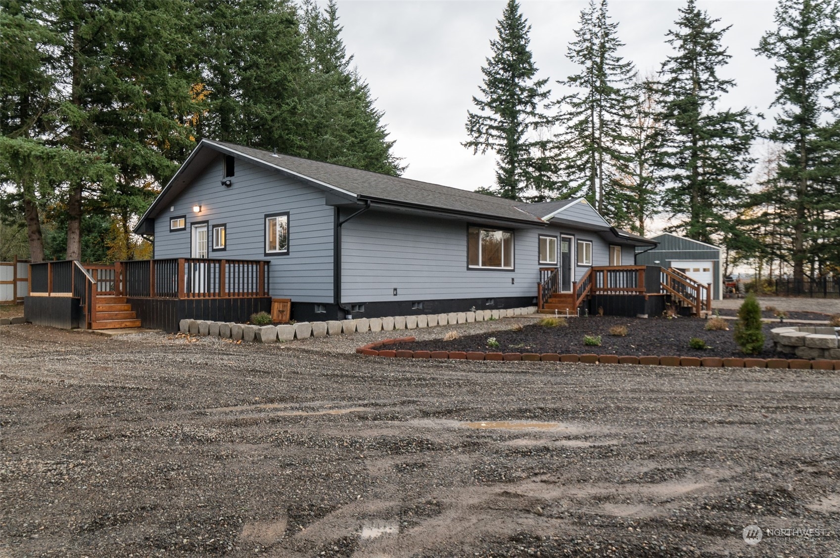 8120 Delta Line Road Custer, WA 98240 - Photo 26 of 40 a view of a house with a yard