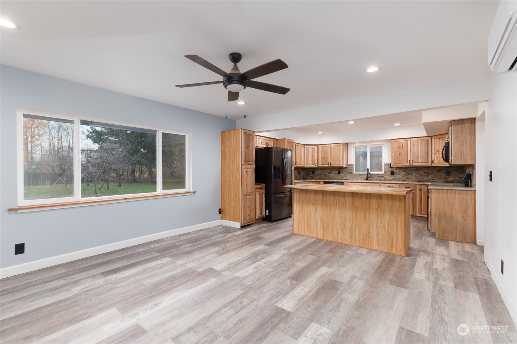 8120 Delta Line Road Custer, WA 98240 - Photo 8 of 40 a kitchen with stainless steel appliances granite countertop a refrigerator and a sink