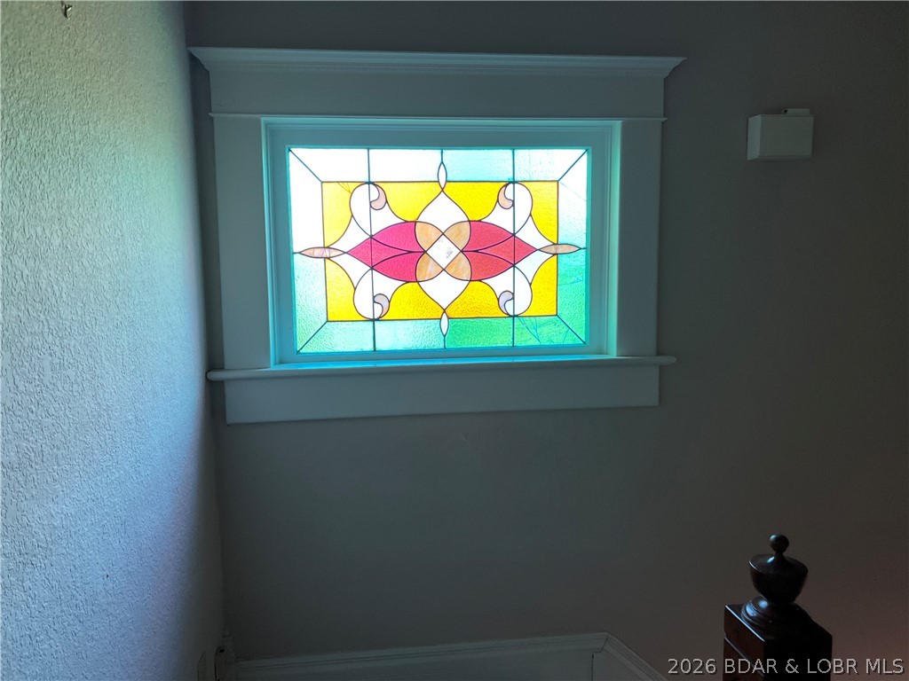 601 East Newton Street Eldon, MO 65026 - Photo 20 of 61 Upstairs landing stained glass.