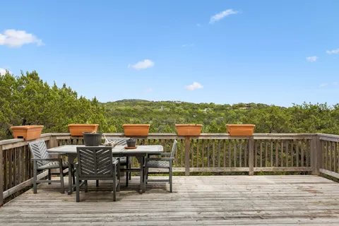 a view of a terrace with seating area