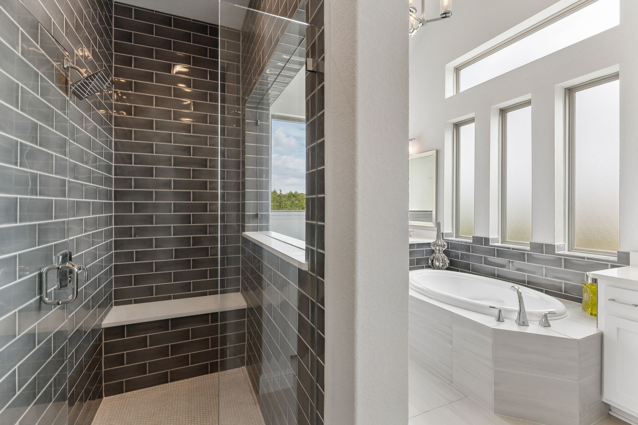 7212 Celebration Court Leander, TX 78645 - Photo 26 of 39 a bathroom with a bathtub and shower