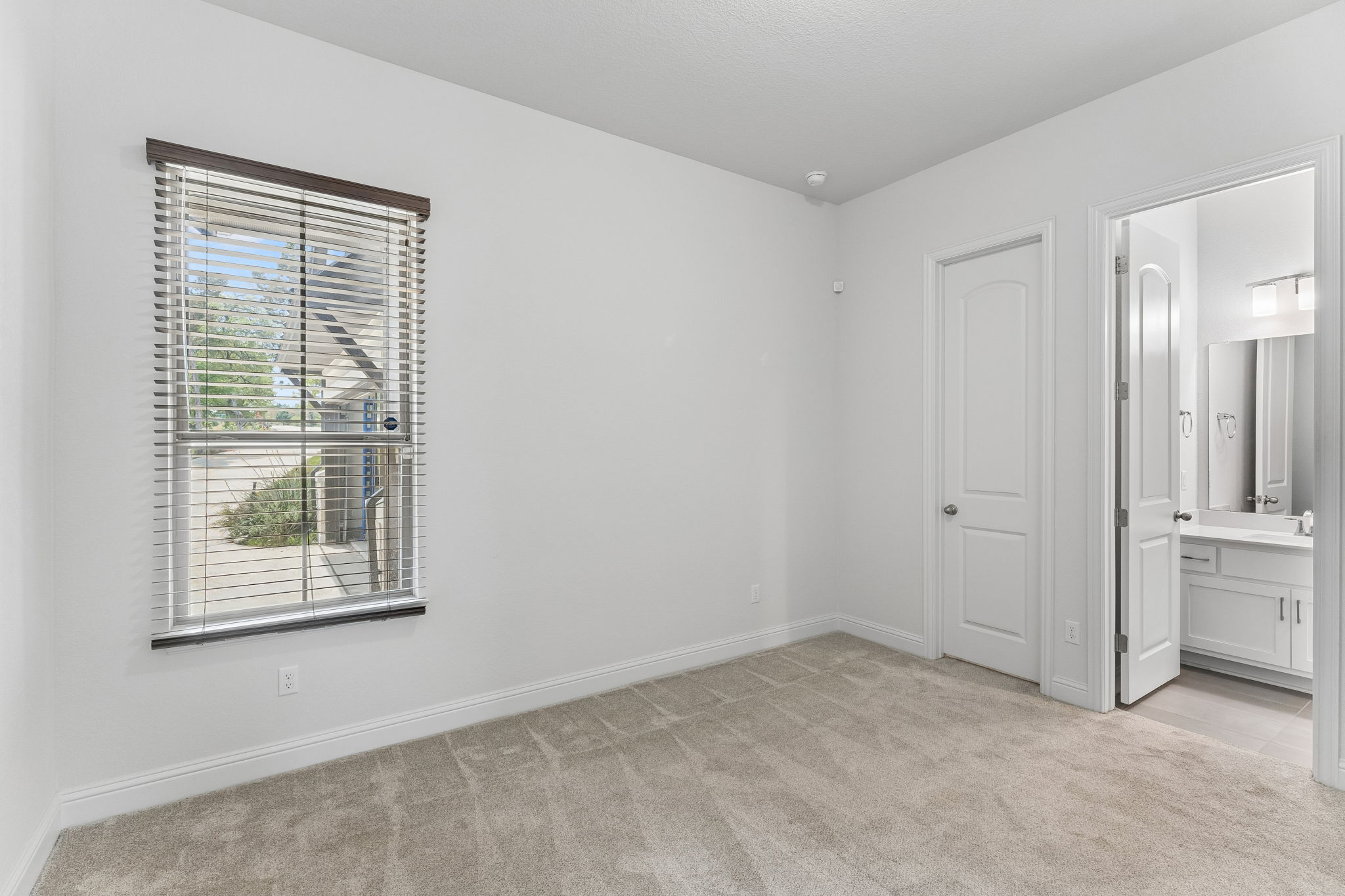 7212 Celebration Court Leander, TX 78645 - Photo 28 of 39 a view of an empty room with closet and a window