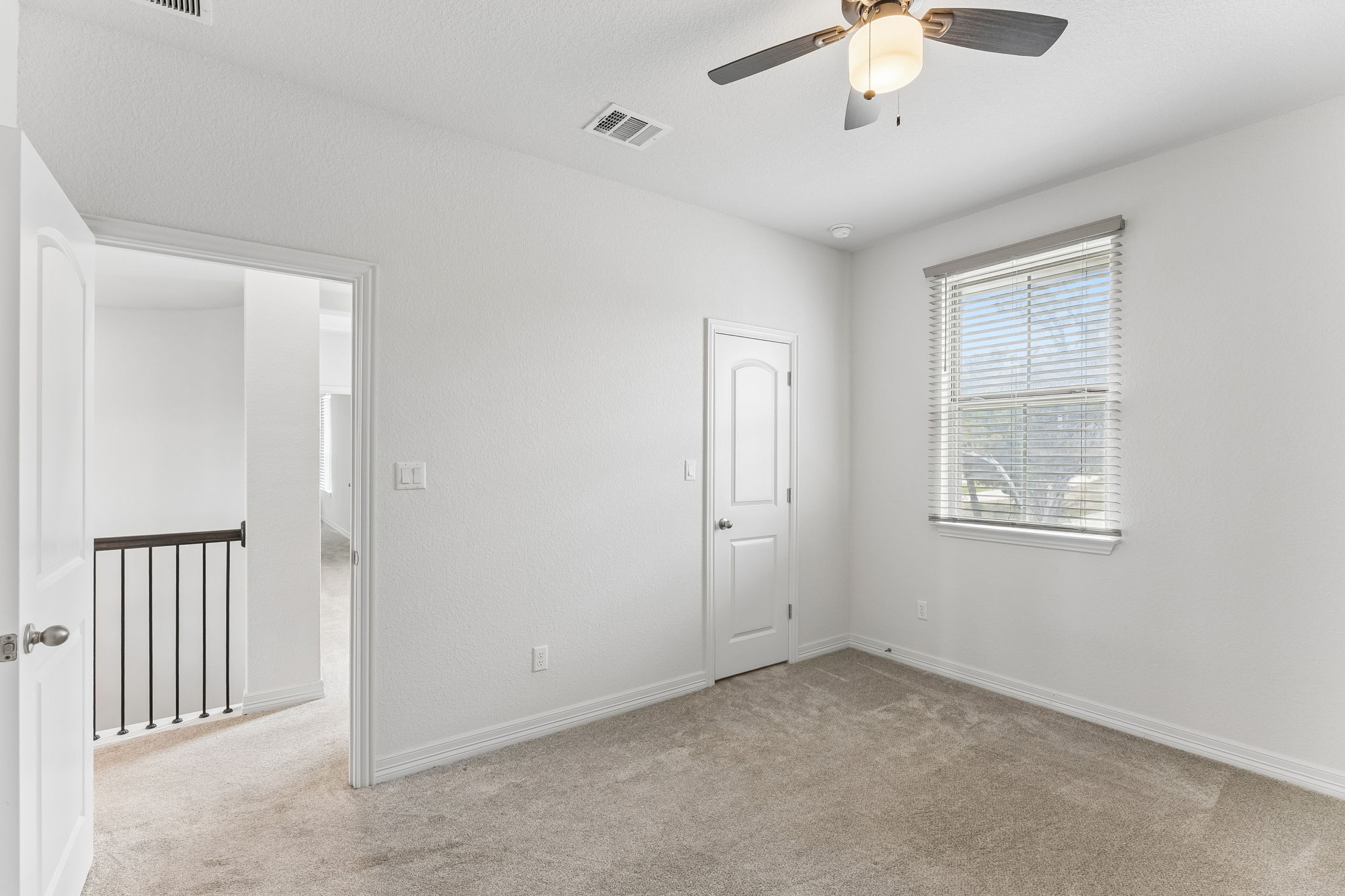 7212 Celebration Court Leander, TX 78645 - Photo 31 of 39 a view of an empty room with a window