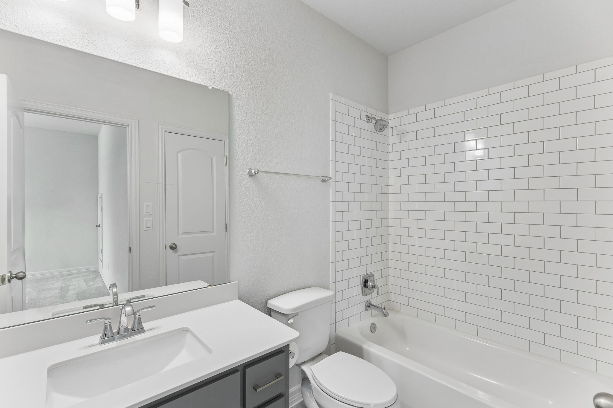 7212 Celebration Court Leander, TX 78645 - Photo 32 of 39 a bathroom with a sink a toilet and shower