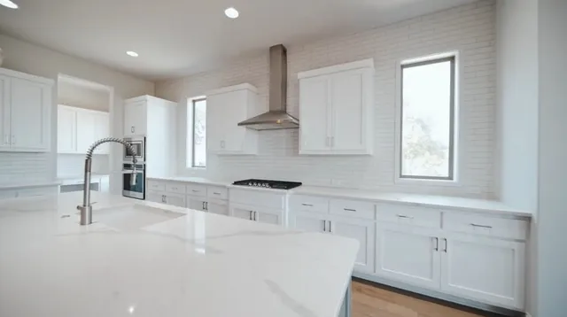 a view of kitchen and windows