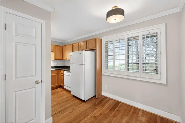 a view of a storage & utility room with a window