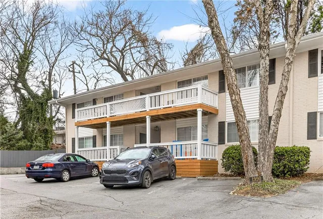 a car parked in front of a building