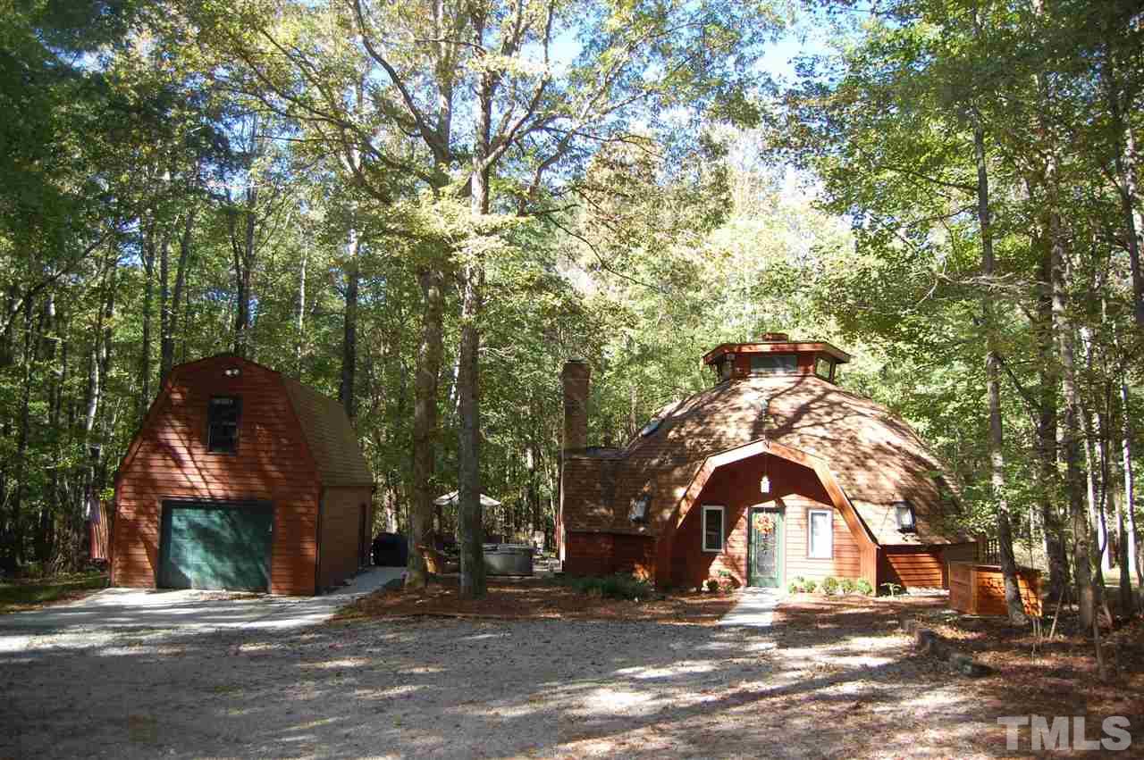 1121 Batchelor Road Apex, NC 27523 - Photo 1 of 30 Custom 1 ½ Story Geodesic 40 foot low profile Dome home w/detached garage & floored space upstairs (22.6x10.5 Insulated) built by Tommy King w/ Triangle Builders, Inc.!