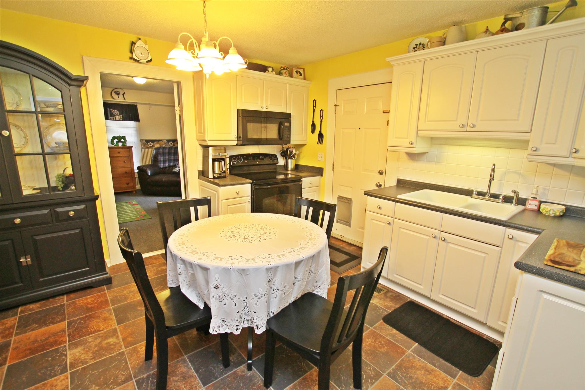 5642 Hopewell Road Springfield, TN 37172 - Photo 7 of 30 a view of a dining room with furniture and wooden floor