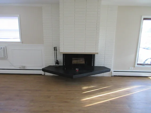 a living room with a fireplace
