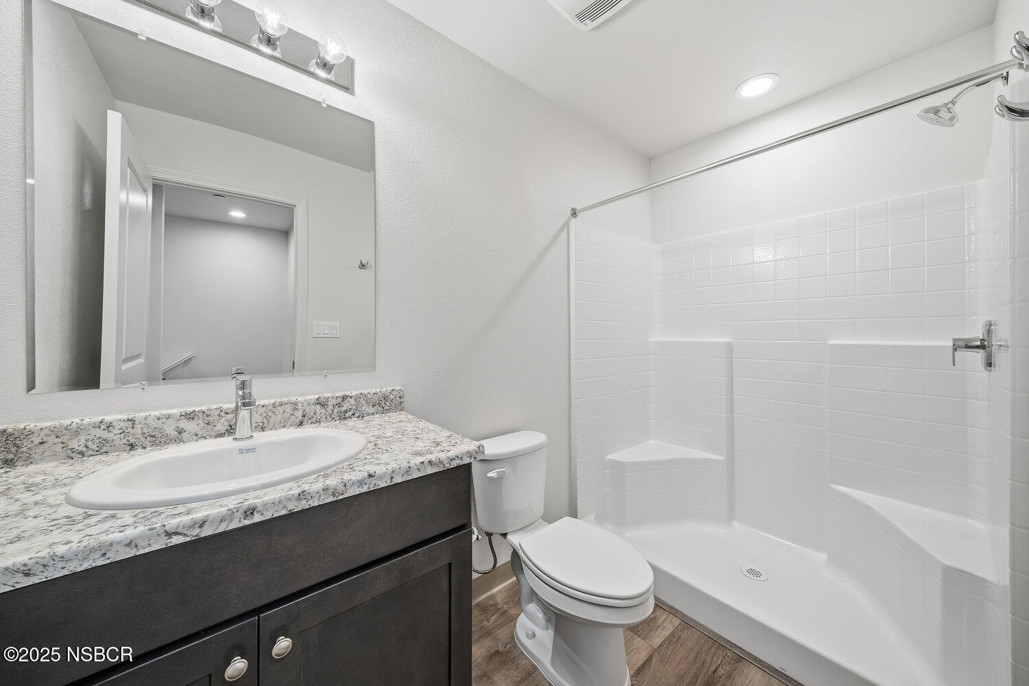 529 South Pine Street Santa Maria, CA 93458 - Photo 17 of 80 a bathroom with a granite countertop sink toilet and shower