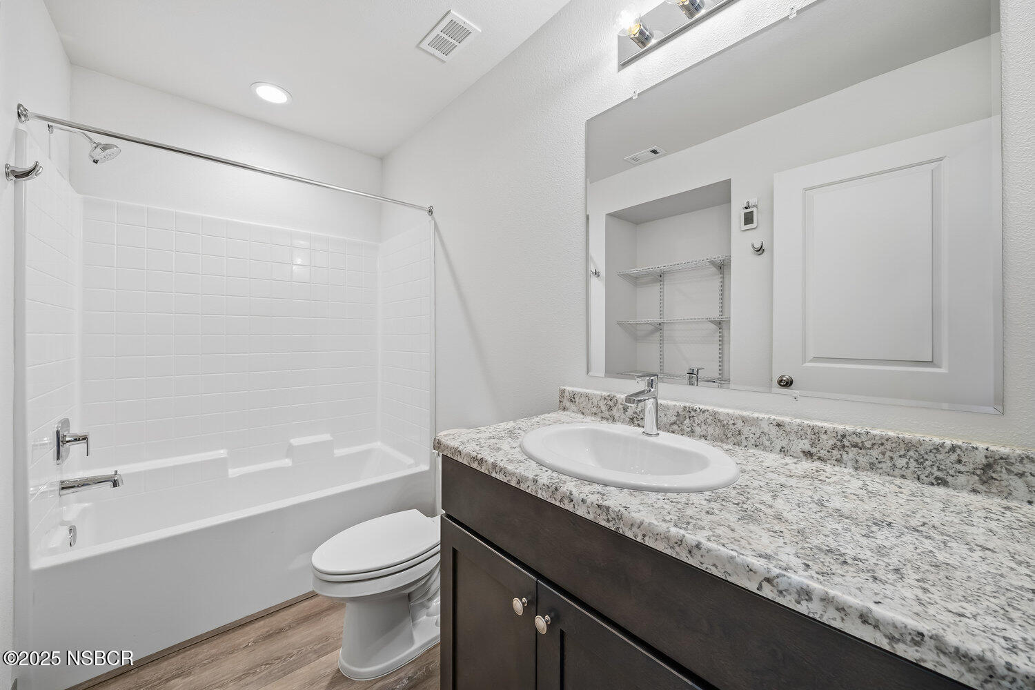 529 South Pine Street Santa Maria, CA 93458 - Photo 19 of 80 a bathroom with a granite countertop sink toilet and shower