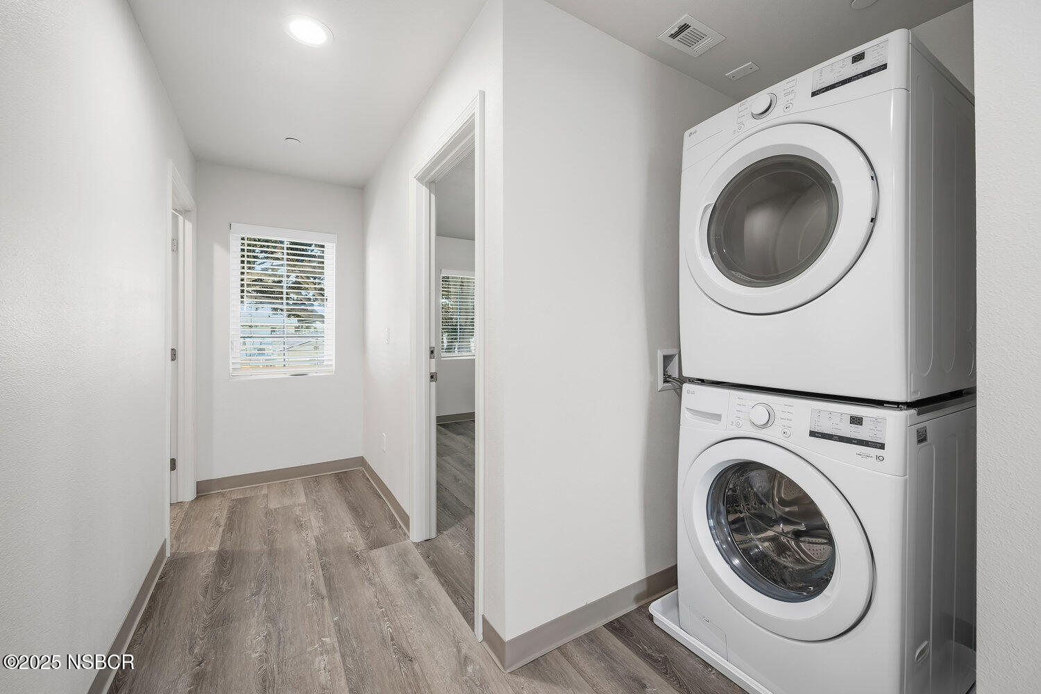 529 South Pine Street Santa Maria, CA 93458 - Photo 21 of 80 a view of a hallway with washer and dryer