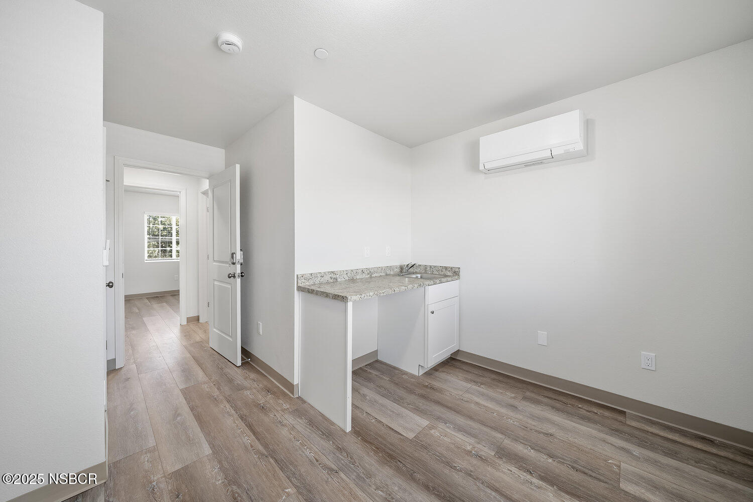529 South Pine Street Santa Maria, CA 93458 - Photo 36 of 80 a view of a room with wooden floor
