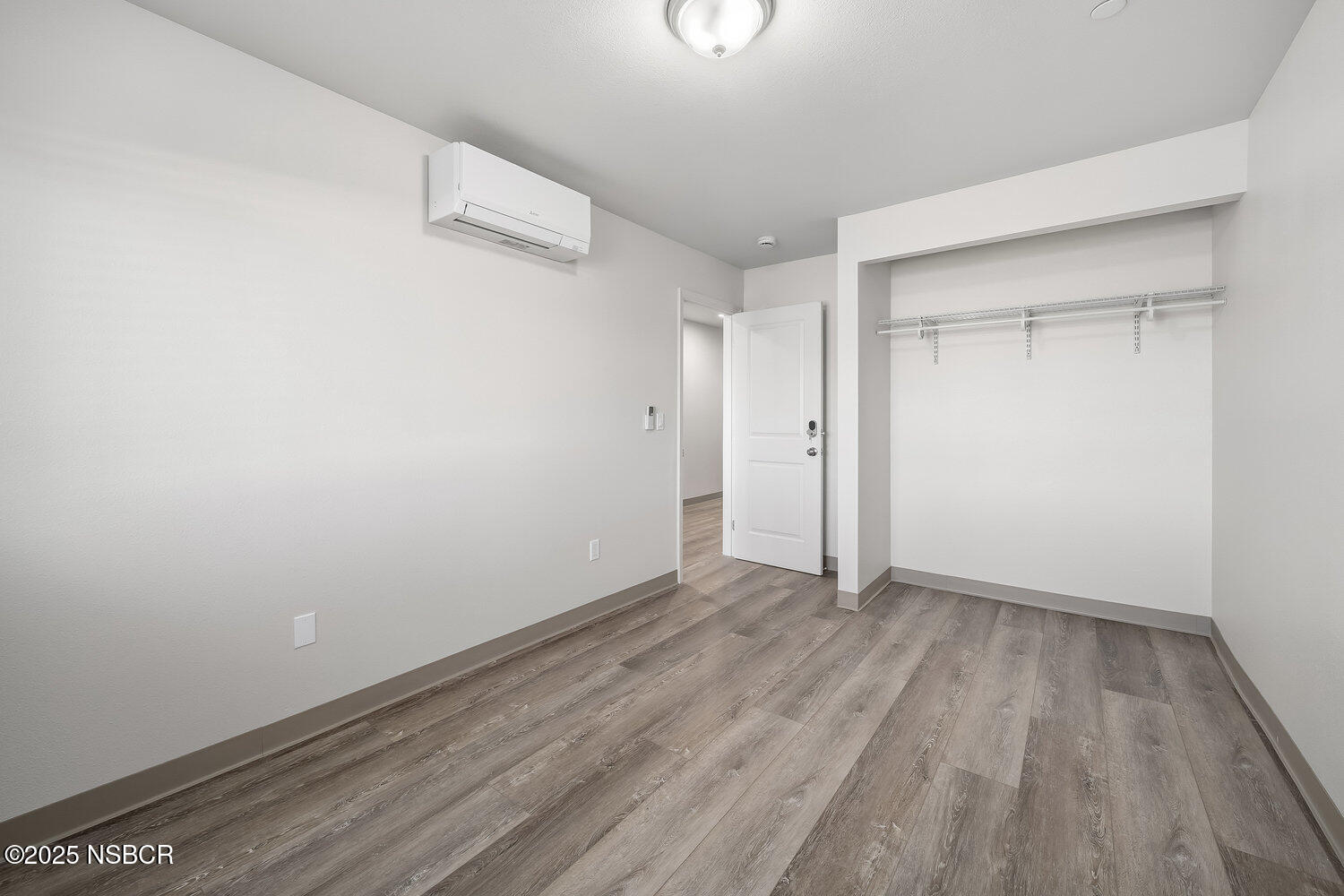 529 South Pine Street Santa Maria, CA 93458 - Photo 47 of 80 a view of an empty room with wooden floor