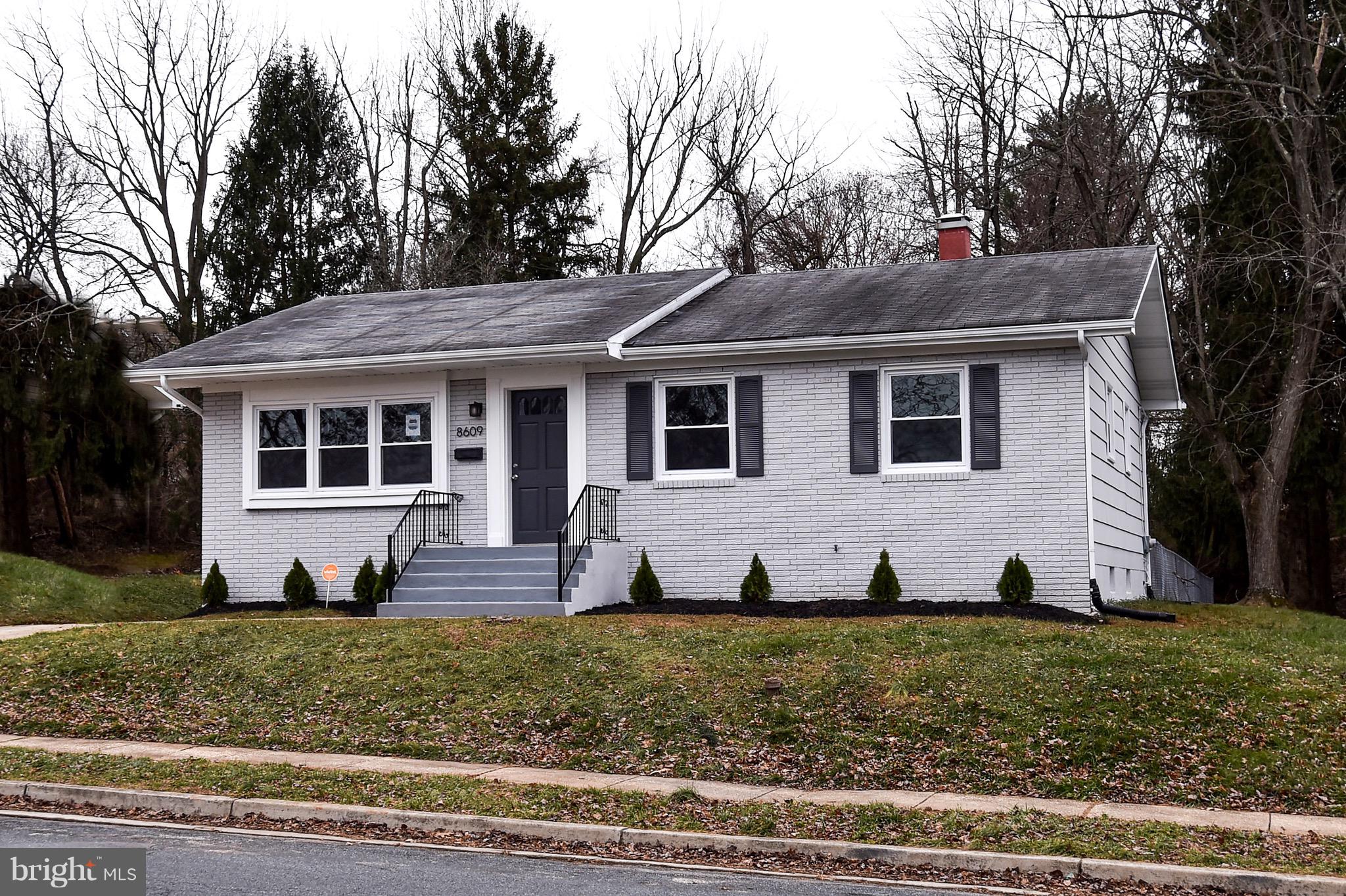 8609 Woodspring Road Randallstown, MD 21133 - Photo 1 of 43 a view of house with a yard