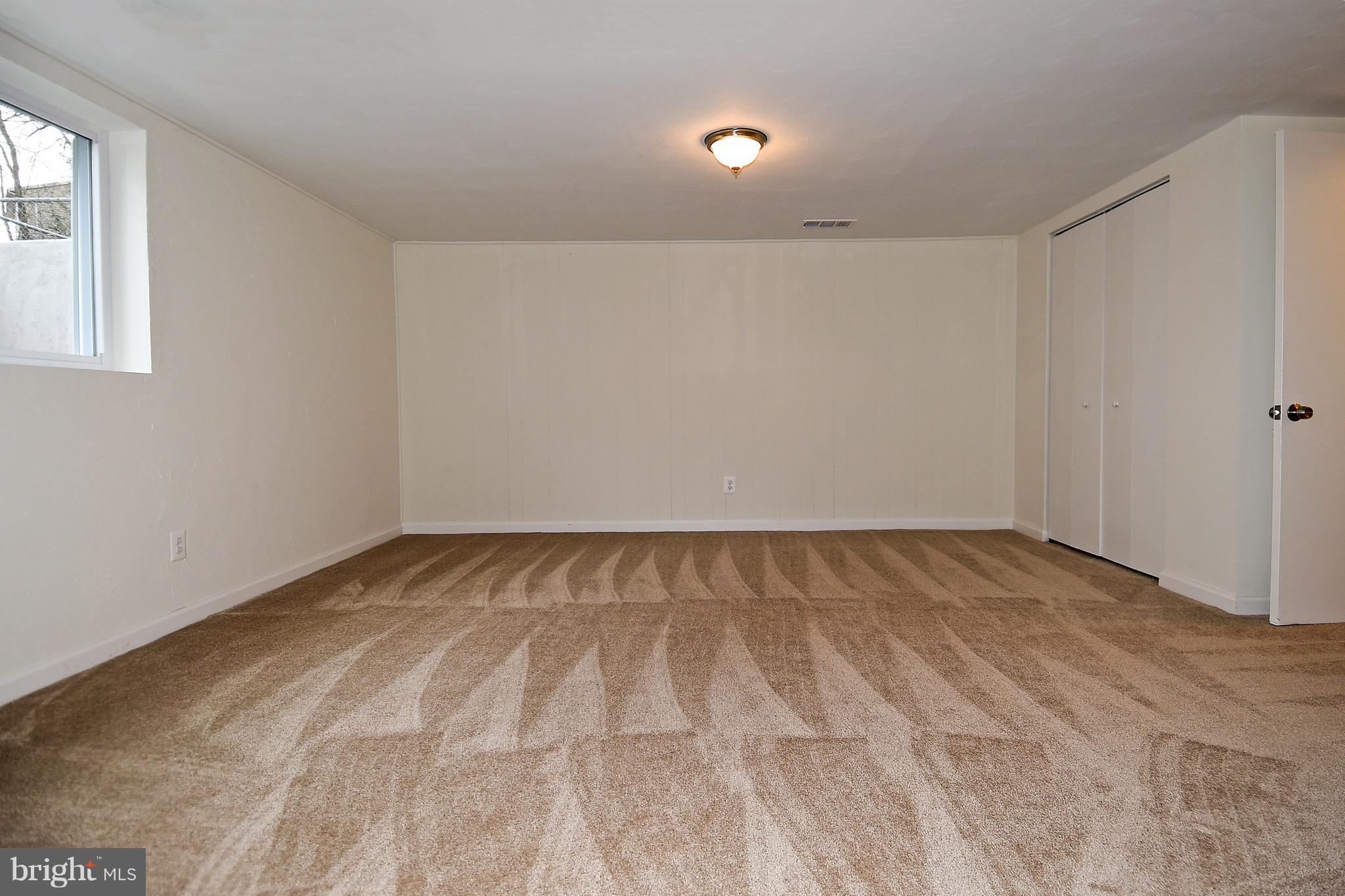 8609 Woodspring Road Randallstown, MD 21133 - Photo 32 of 43 a view of an empty room