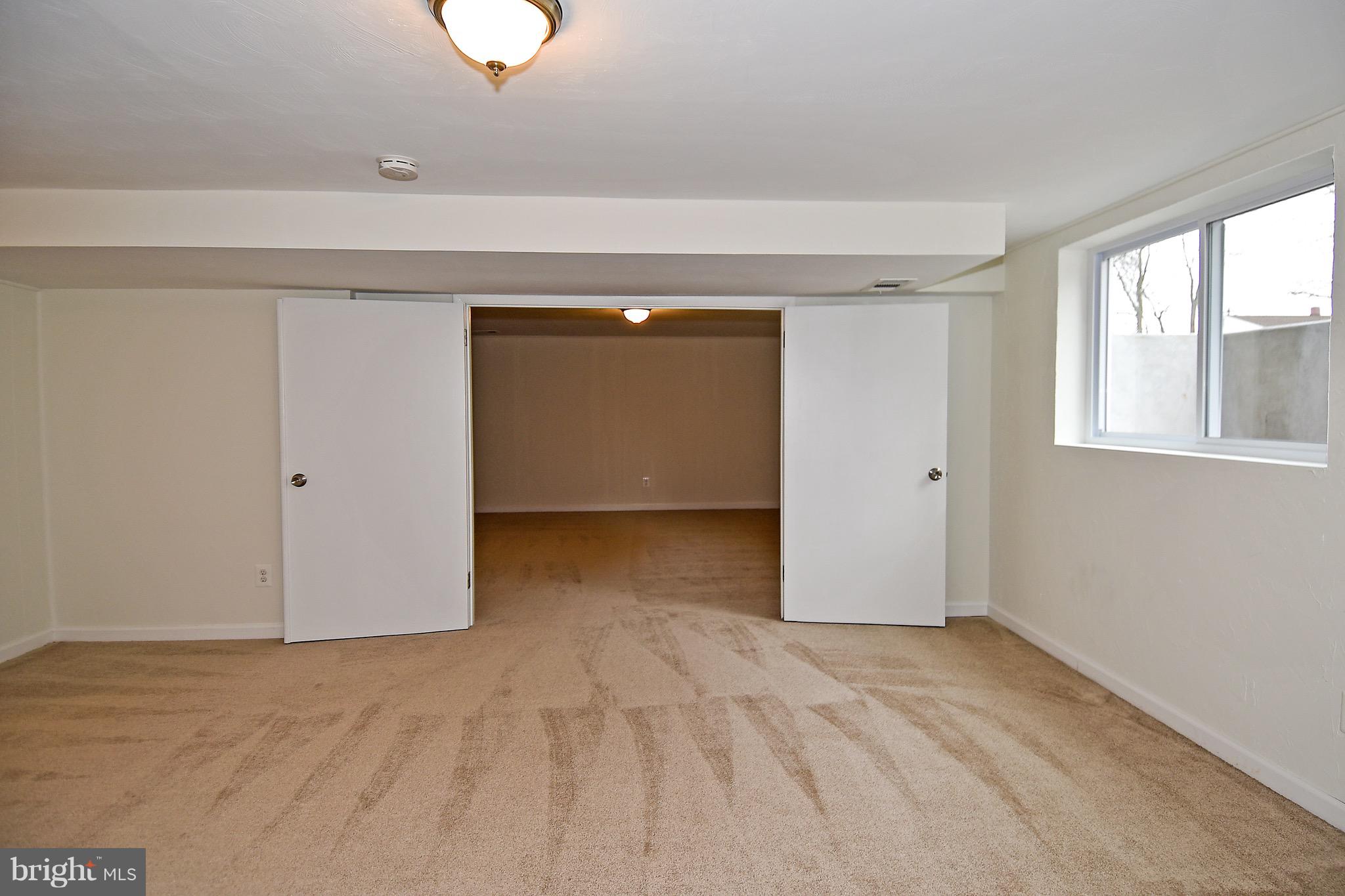 8609 Woodspring Road Randallstown, MD 21133 - Photo 33 of 43 a view of empty room with window