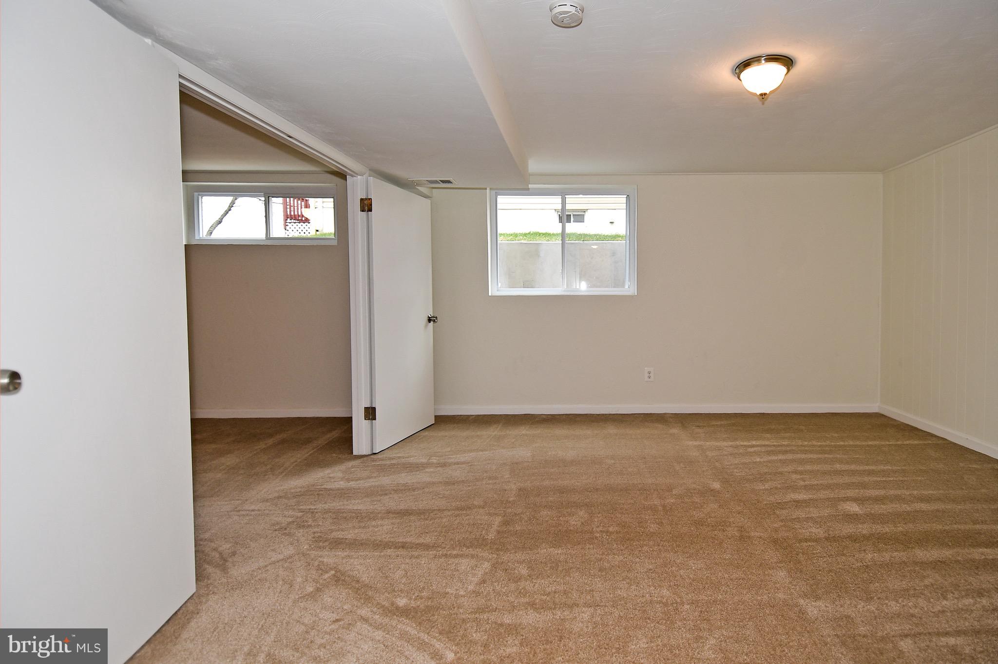 8609 Woodspring Road Randallstown, MD 21133 - Photo 35 of 43 an empty room with window