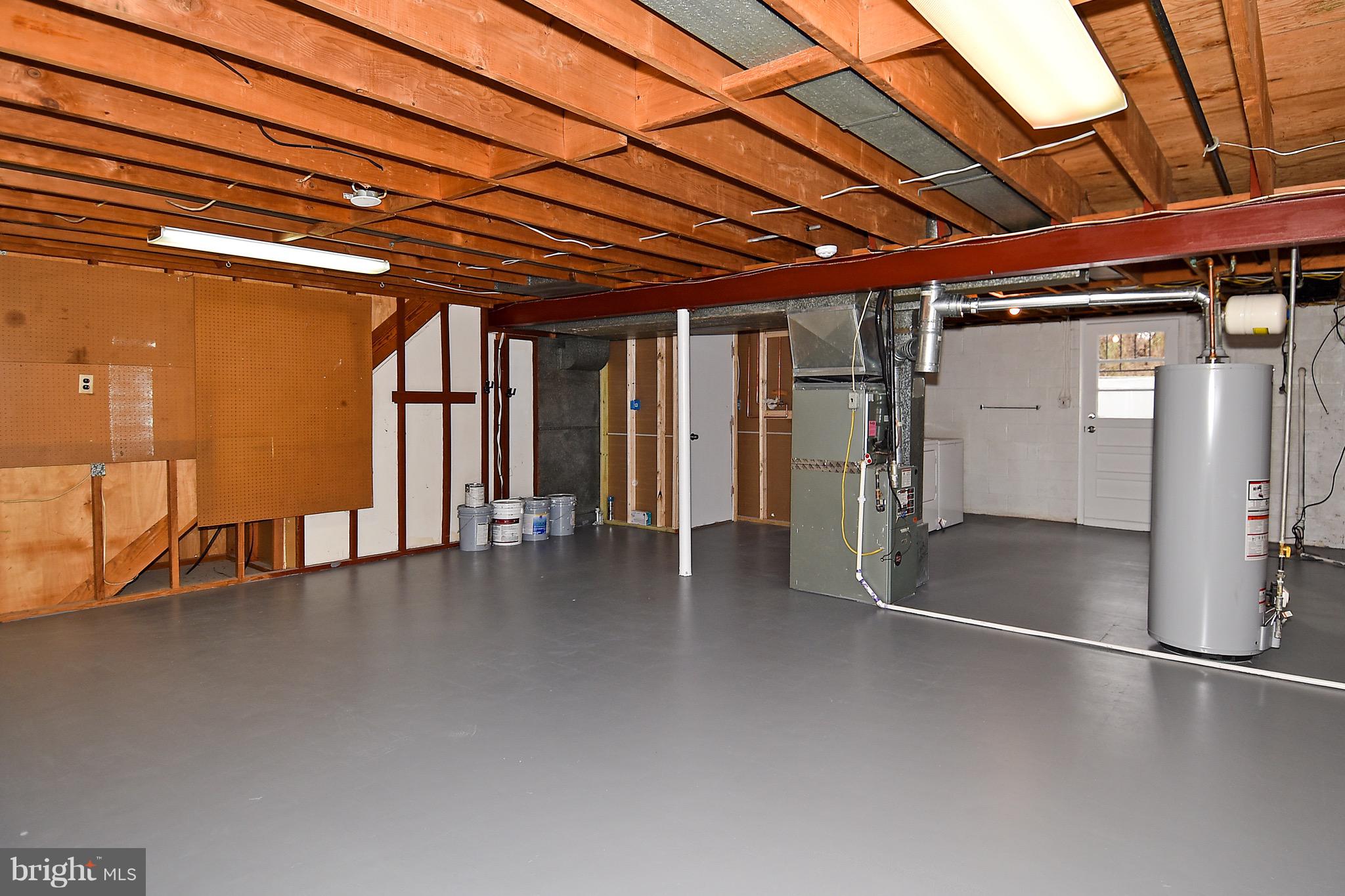 8609 Woodspring Road Randallstown, MD 21133 - Photo 40 of 43 a view of a indoor garage