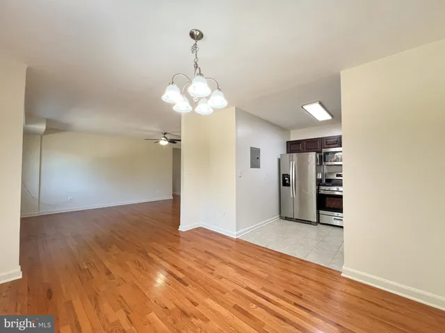 a view of a livingroom with wooden floor