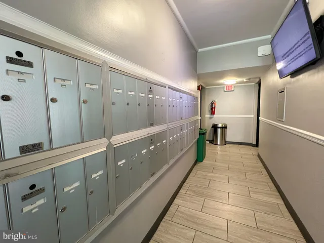 a long hallway with cabinets