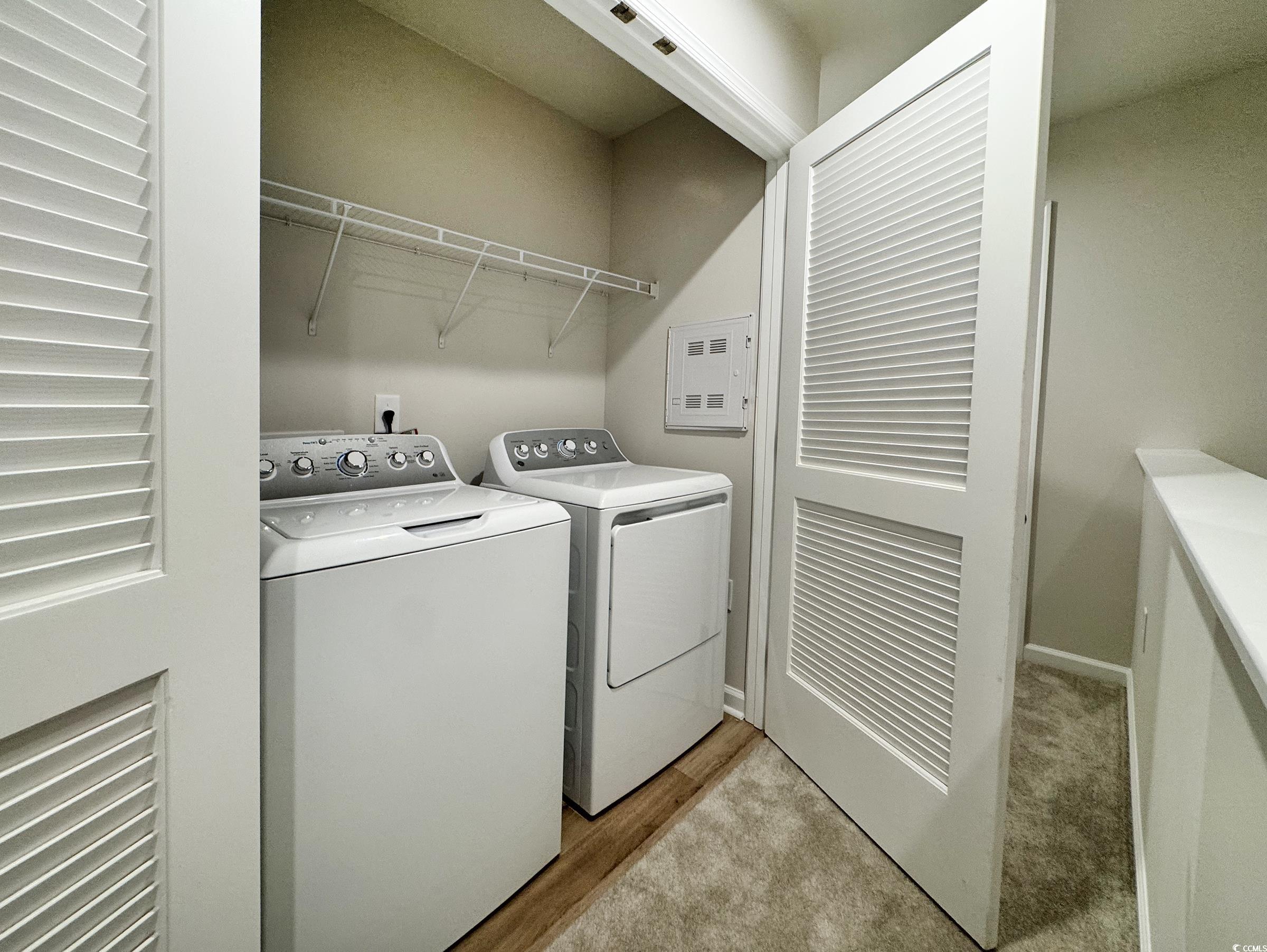 157 B Villa Grande Street, Unit B Myrtle Beach, SC 29579 - Photo 10 of 28 Laundry area featuring light wood-style floors and independent washer and dryer