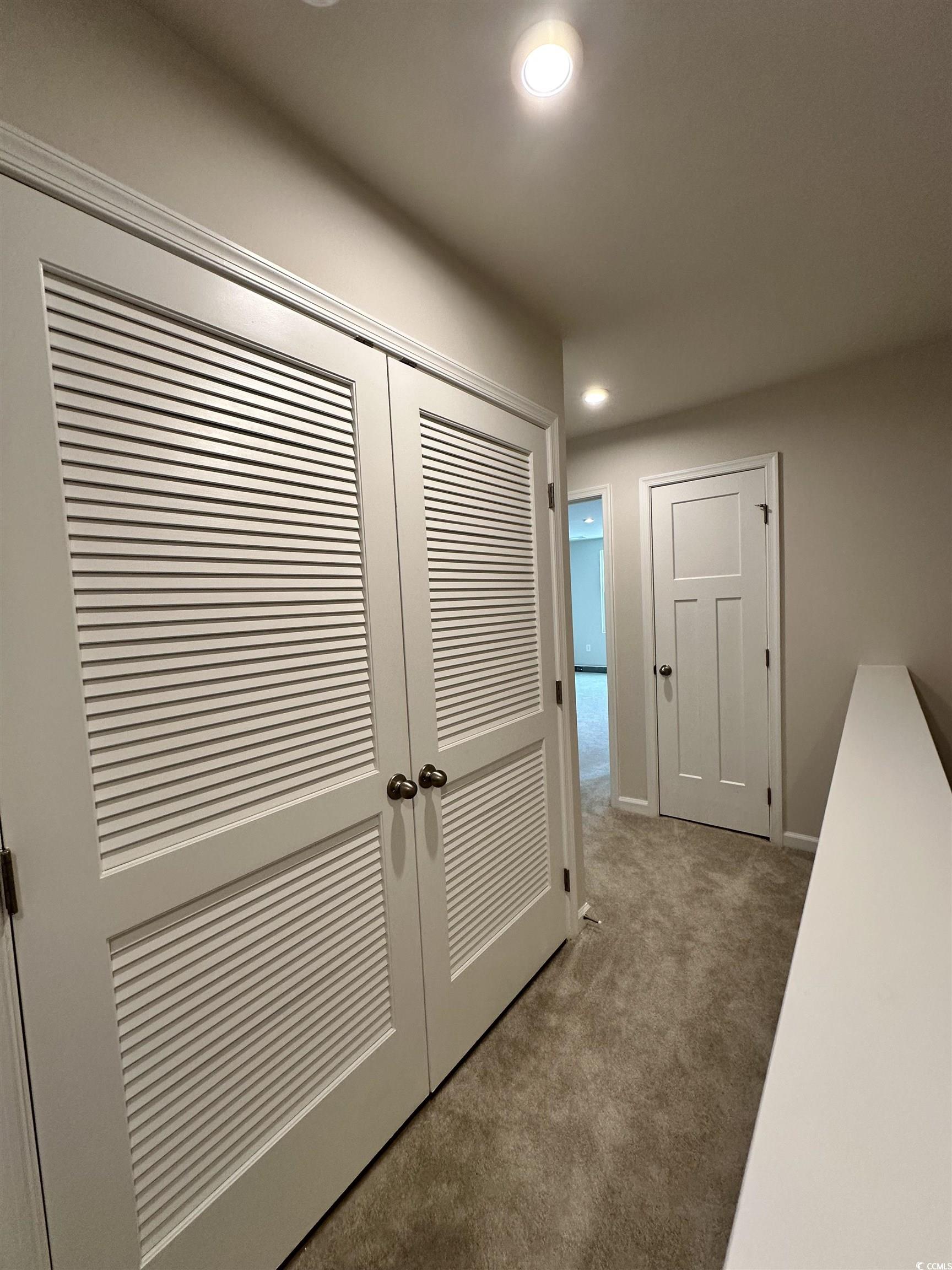 157 B Villa Grande Street, Unit B Myrtle Beach, SC 29579 - Photo 11 of 28 Hallway with carpet floors and recessed lighting