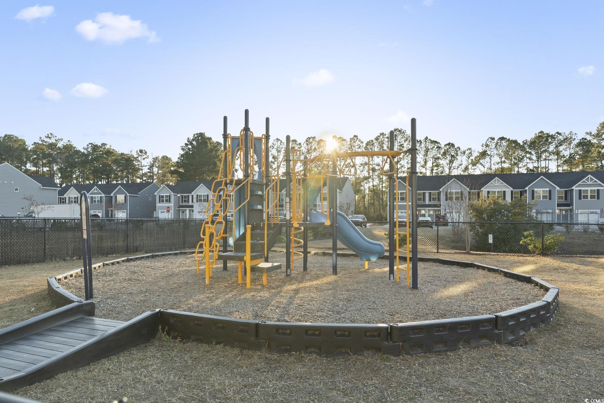 157 B Villa Grande Street, Unit B Myrtle Beach, SC 29579 - Photo 26 of 28 Community play area featuring a residential view