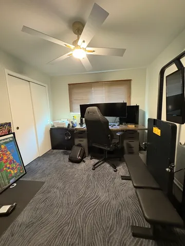 a room with furniture and a flat screen tv