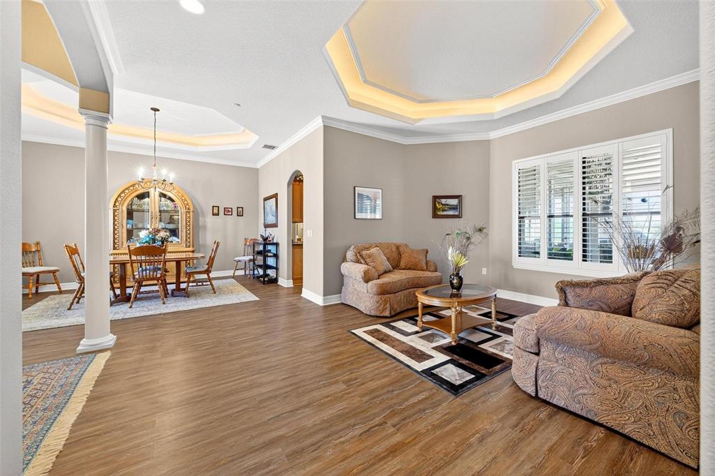 19850 Sugarloaf Mountain Road Clermont, FL 34715 - Photo 11 of 100 a living room with furniture and a large window