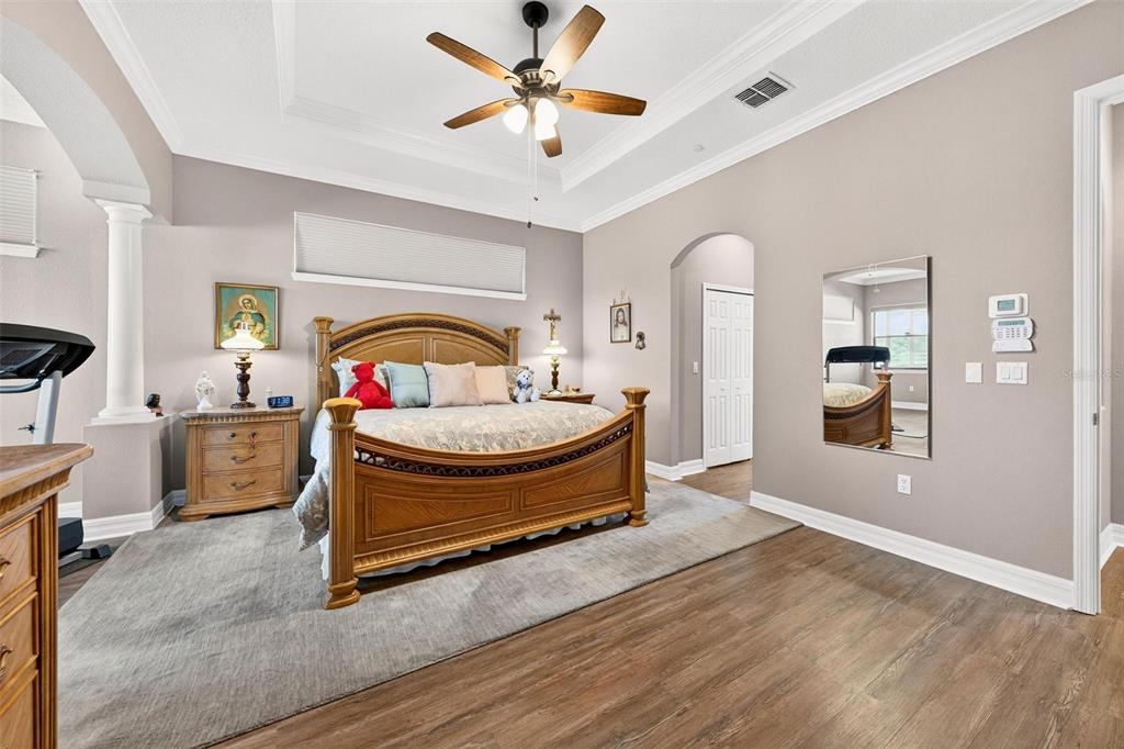 19850 Sugarloaf Mountain Road Clermont, FL 34715 - Photo 16 of 100 a living room with furniture a flat screen tv and a table