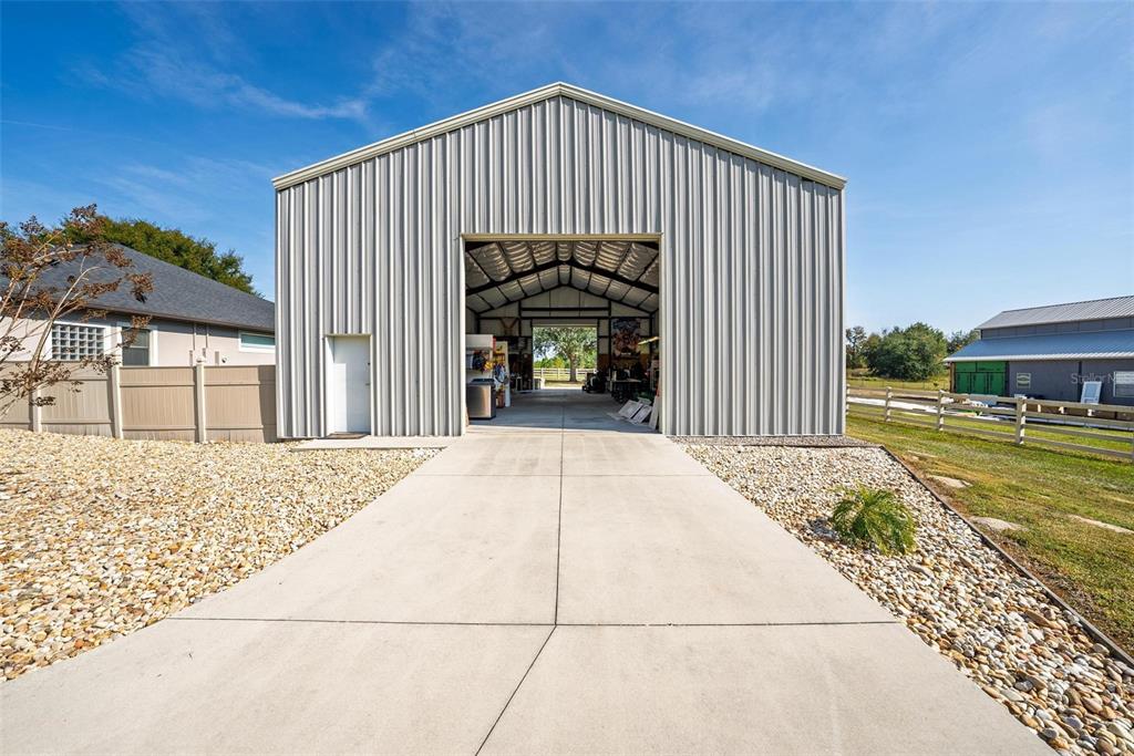 19850 Sugarloaf Mountain Road Clermont, FL 34715 - Photo 4 of 100 a view of a house with a patio