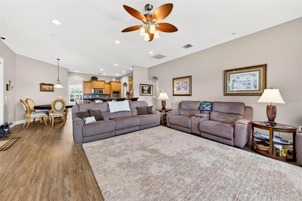 19850 Sugarloaf Mountain Road Clermont, FL 34715 - Photo 48 of 100 a living room with furniture and wooden floor