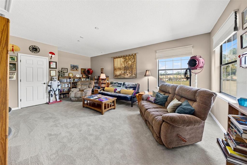 19850 Sugarloaf Mountain Road Clermont, FL 34715 - Photo 67 of 100 a living room with furniture and a window