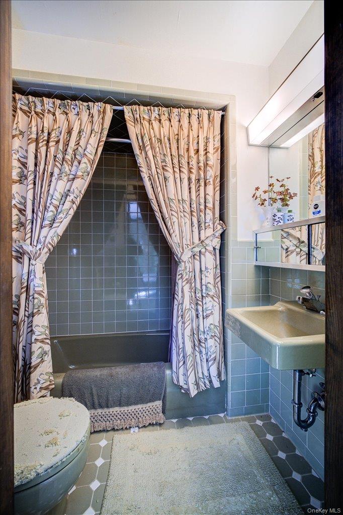 3 Stone Path Rock Hill, NY 12775 - Photo 19 of 33 a bathroom with a sink a toilet and shower