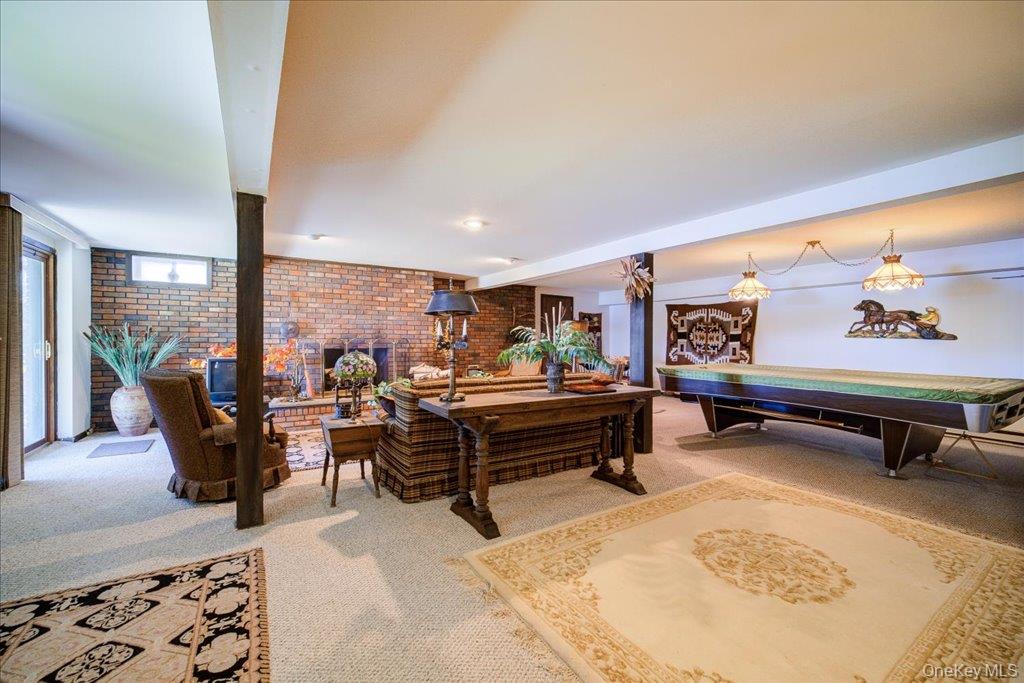 3 Stone Path Rock Hill, NY 12775 - Photo 20 of 33 a living room with furniture a rug and a large window