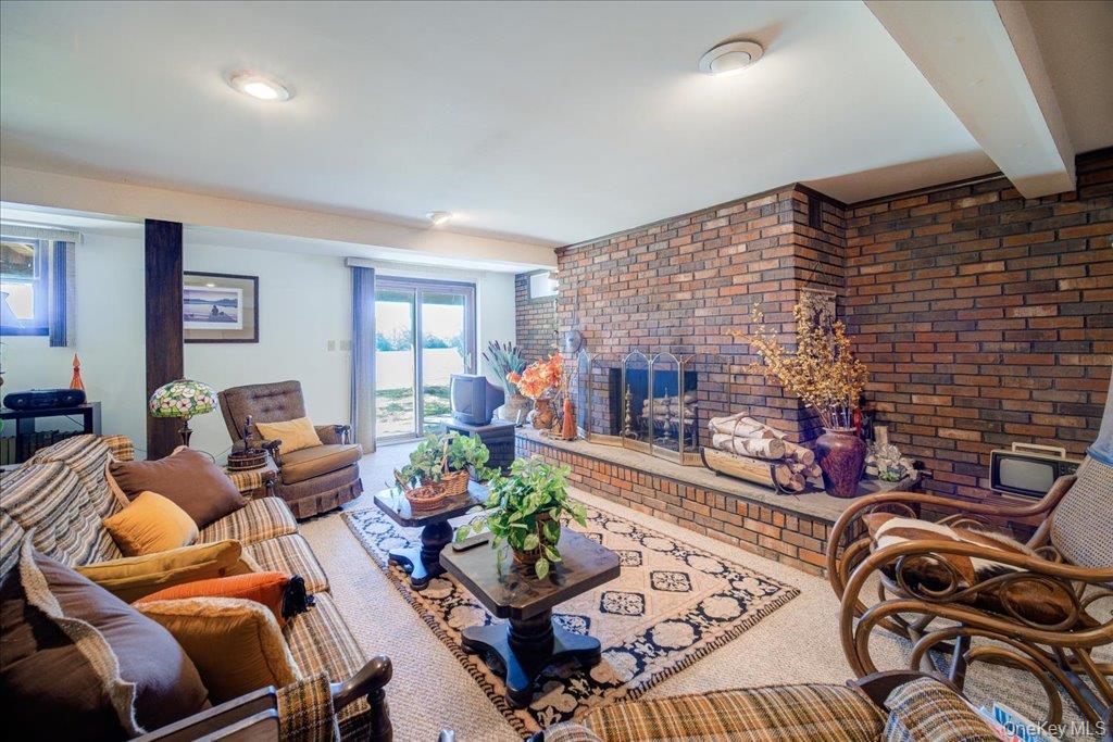 3 Stone Path Rock Hill, NY 12775 - Photo 22 of 33 a living room with furniture and a fireplace