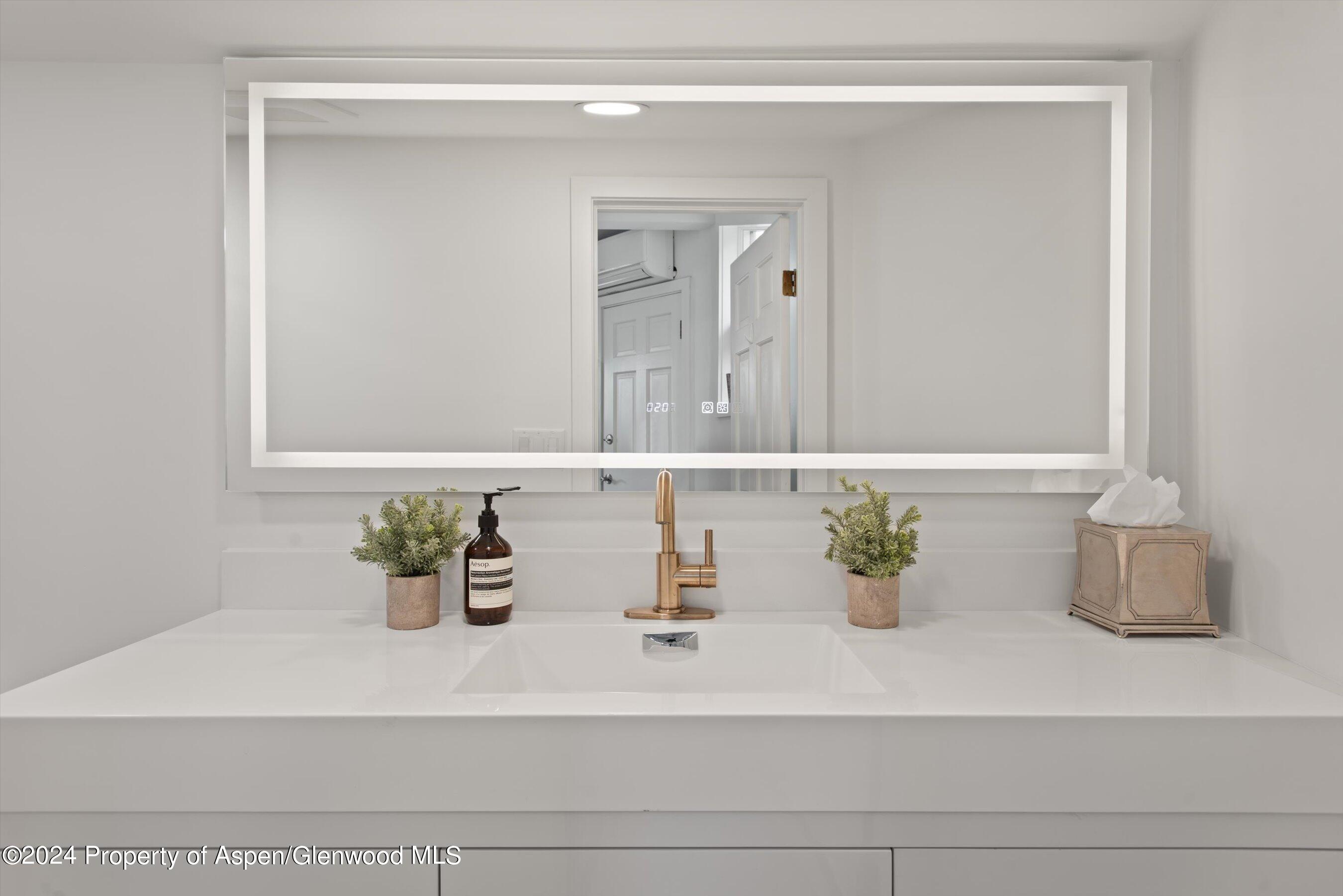 140 Maple Lane Aspen, CO 81611 - Photo 22 of 37 a bathroom with a sink