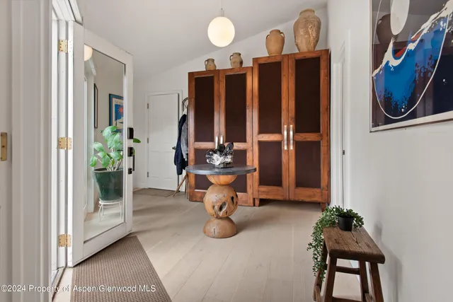 a view of an entryway with garden